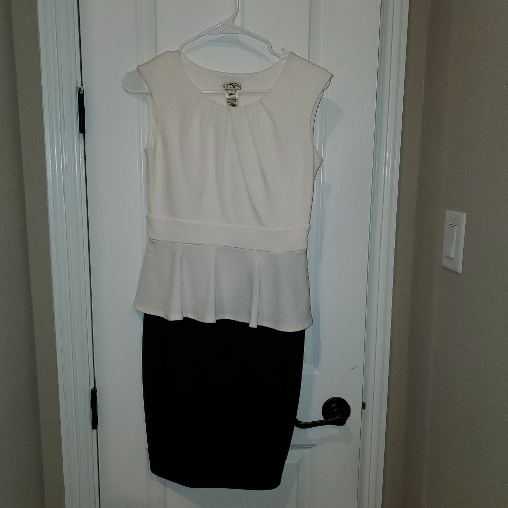 White and black peplum dress